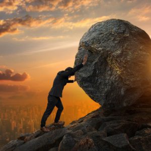 business-man-pushing-large-stone-up-hill-business-heavy-tasks-problems-concept_104033-12